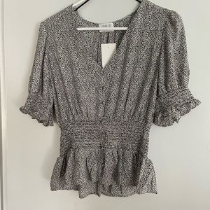 Sienna Sky white and black spotted blouse